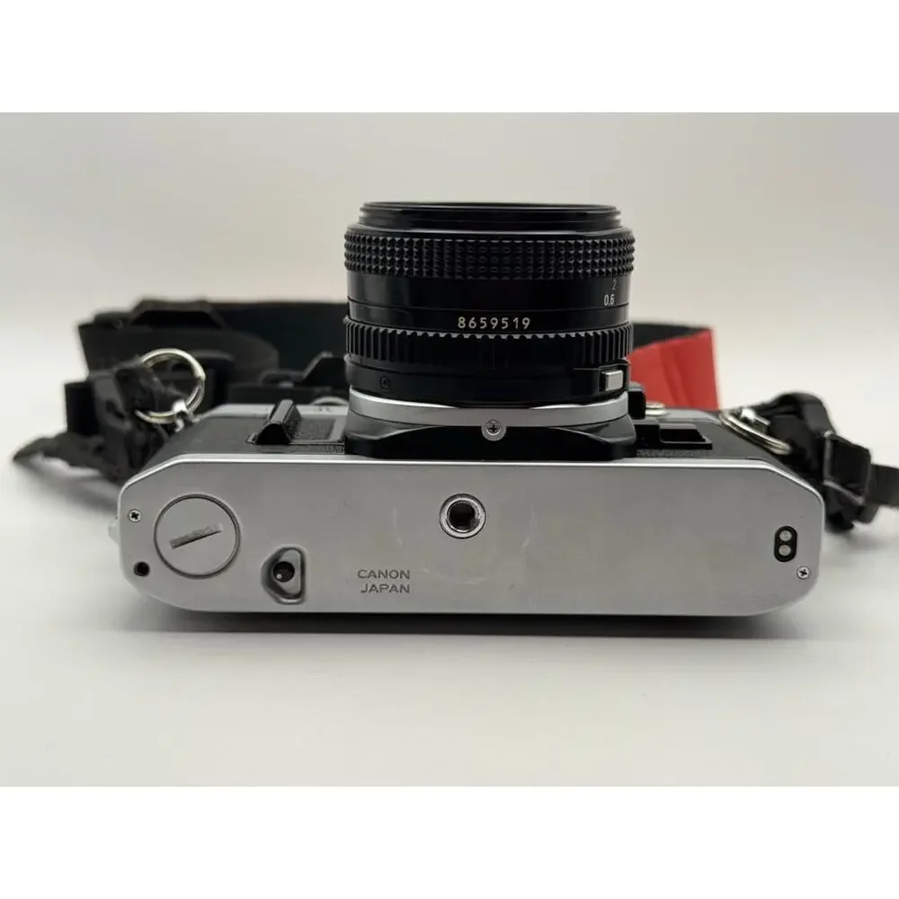 Canon AE-1 Tested 35mm SLR Film Camera Interchangeable Lens Strap Japan Vintage